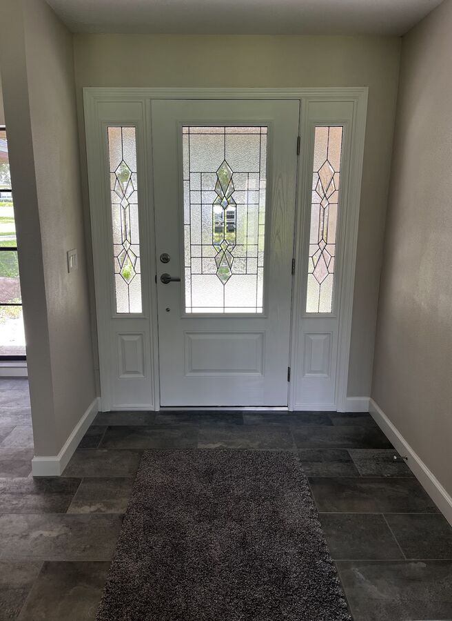 New entry door with decorative glass
