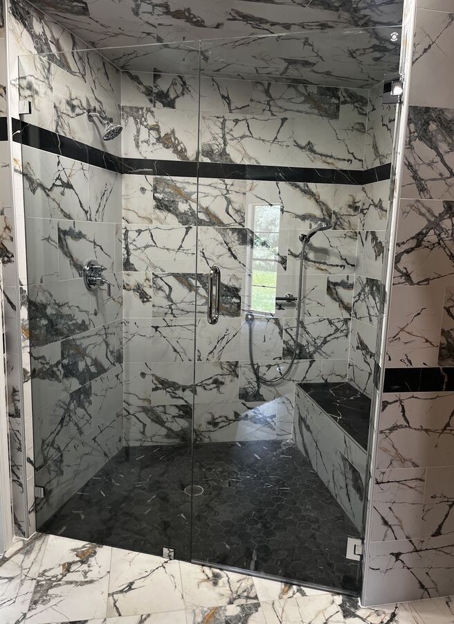 Custom walk-in shower with stone-look tile